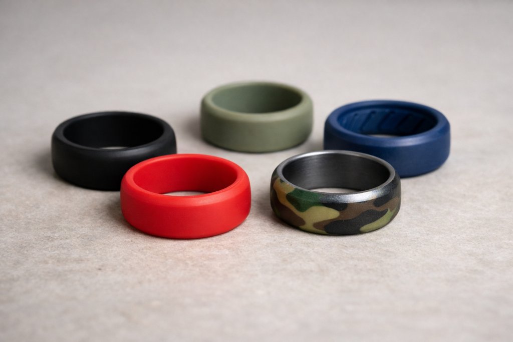 Array of colourful silicone rings on a neutral background