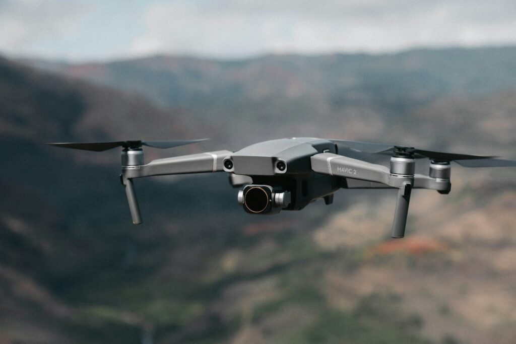 Photo Cameras and consumer drones